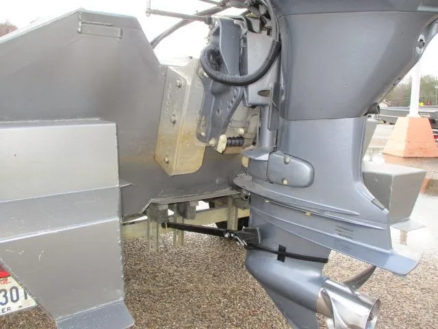 Slide: The Image of 2012 Weldcraft 1652 tunnel hull boat engine detail, showcasing motor and hull design. - 3