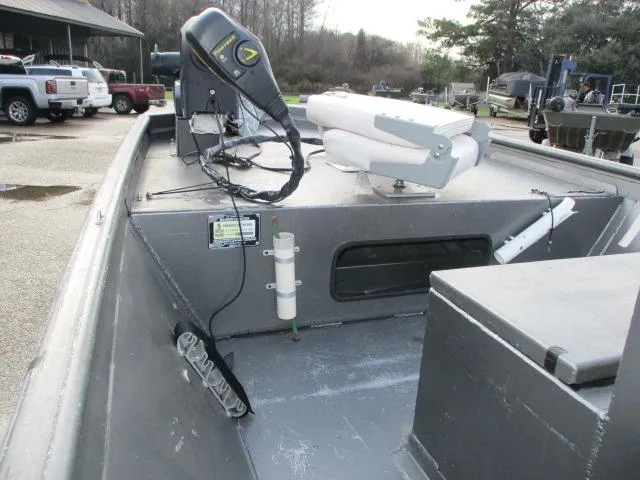 Slide: The Image of 2012 Weldcraft 1652 Tunnel Hull boat interior with equipment and controls. - 6