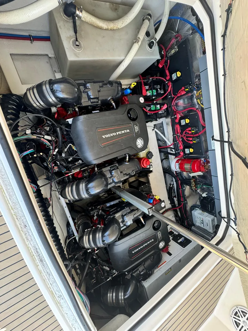 Slide: The Image of Engine compartment of a 2016 Regal 32 Express with Volvo Penta engines. - 29