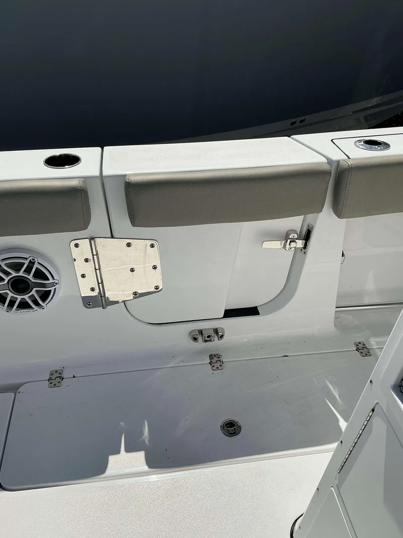 Slide: The Image of 2025 Sportsman 282 Open boat interior with seating and speaker detail. - 19