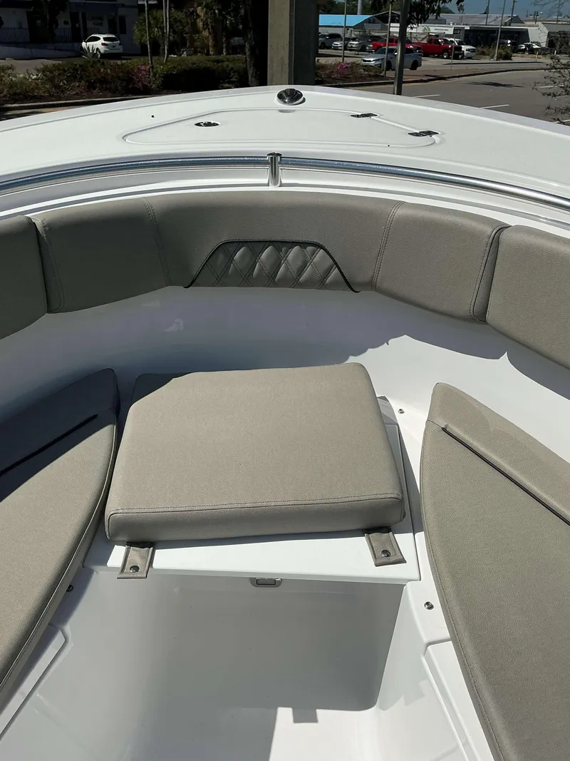 Slide: The Image of 2025 Sportsman 282 Open boat interior with cushioned seating and sleek design. - 20