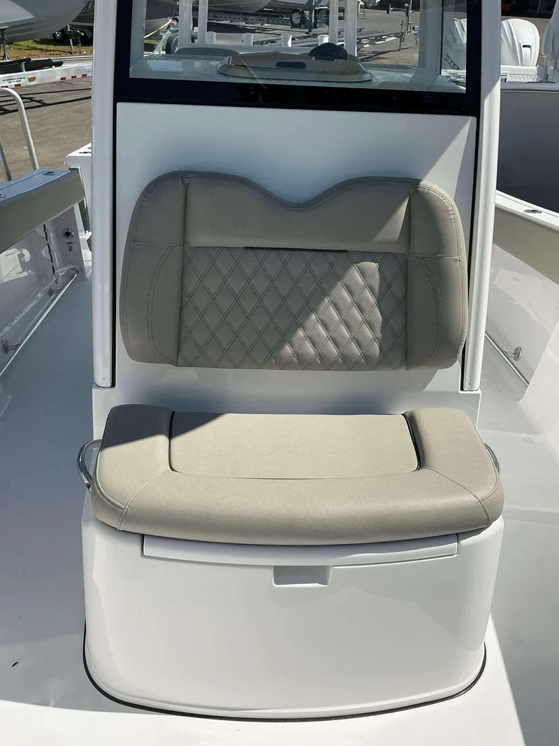 Slide: The Image of 2025 Sportsman 282 Open boat seat with beige cushioned upholstery. - 22