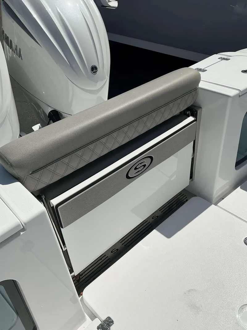 Slide: The Image of 2025 Sportsman 282 Open boat seat and storage compartment detail. - 27