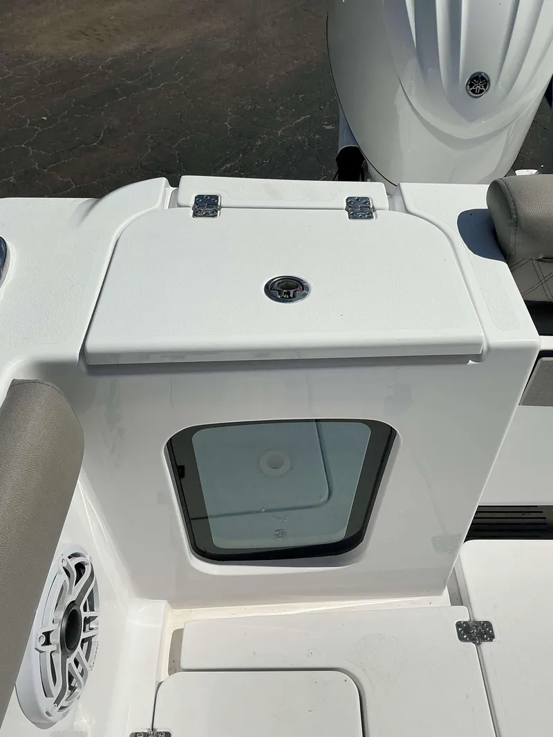 Slide: The Image of 2025 Sportsman 282 Open boat deck with storage compartment and speaker. - 29