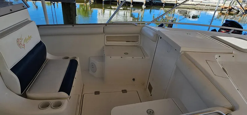 Slide: The Image of Interior view of a 2003 Jefferson Marlago FS35 boat with seating and storage. - 16