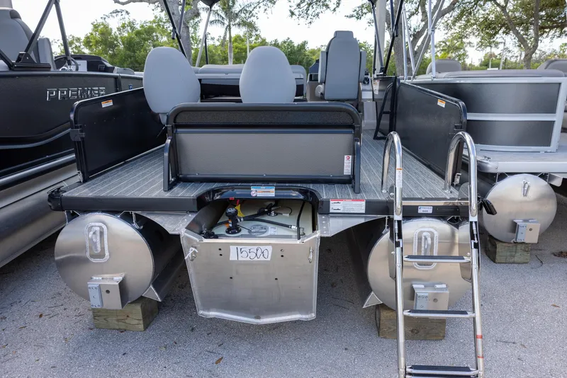 Slide: The Image of 2025 Premier 230 Sunsation RS pontoon boat, rear view with seating and ladder. - 13
