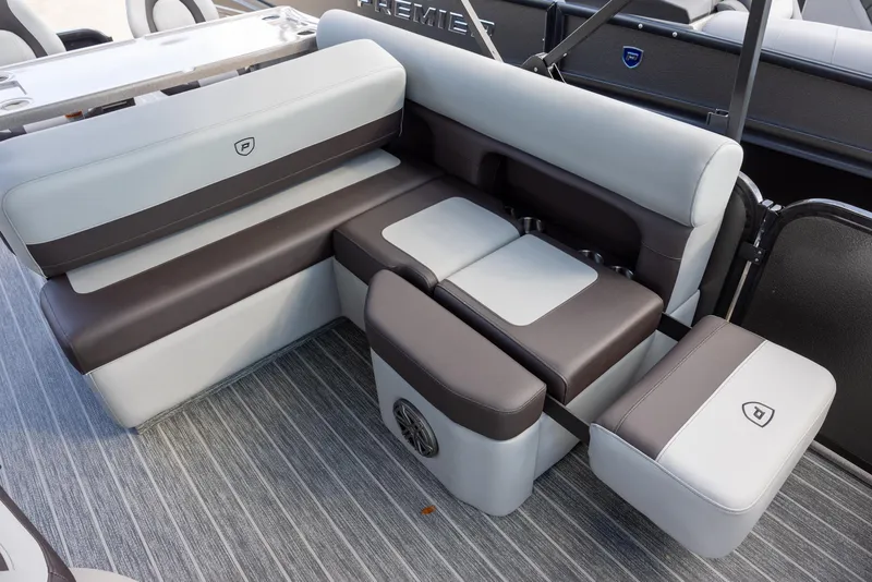 Slide: The Image of 2025 Premier 230 Sunsation RS boat seating with gray and brown upholstery. - 5