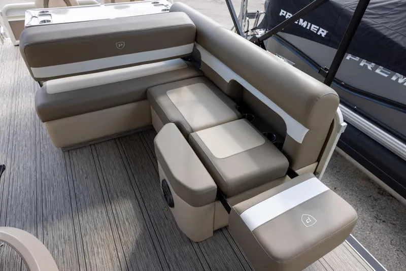 Slide: The Image of 2025 Premier 250 Sunsation RS boat interior with beige seating and modern design. - 11