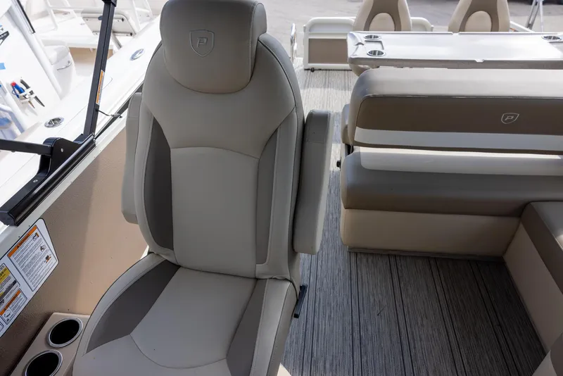 Slide: The Image of 2025 Premier 250 Sunsation RS boat interior with plush seating and modern design. - 14