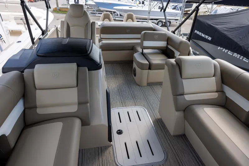 Slide: The Image of Luxurious interior of 2025 Premier 250 Sunsation RS pontoon boat with plush seating. - 8