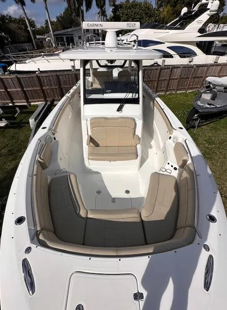 Slide: The Image of 2019 Pursuit S 328 Sport boat with spacious seating and modern design. - 3