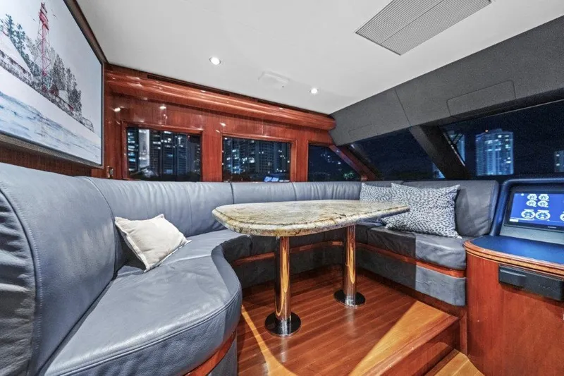 Slide: The Image of Luxurious 2006 Cheoy Lee Motor Yacht interior with elegant seating and modern design. - 18