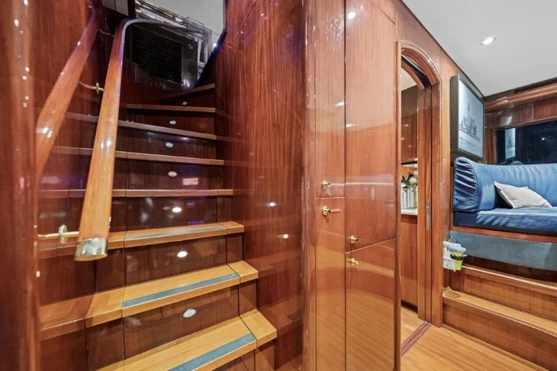 Slide: The Image of Luxurious interior of a 2006 Cheoy Lee Motor Yacht with polished wood and elegant furnishings. - 20