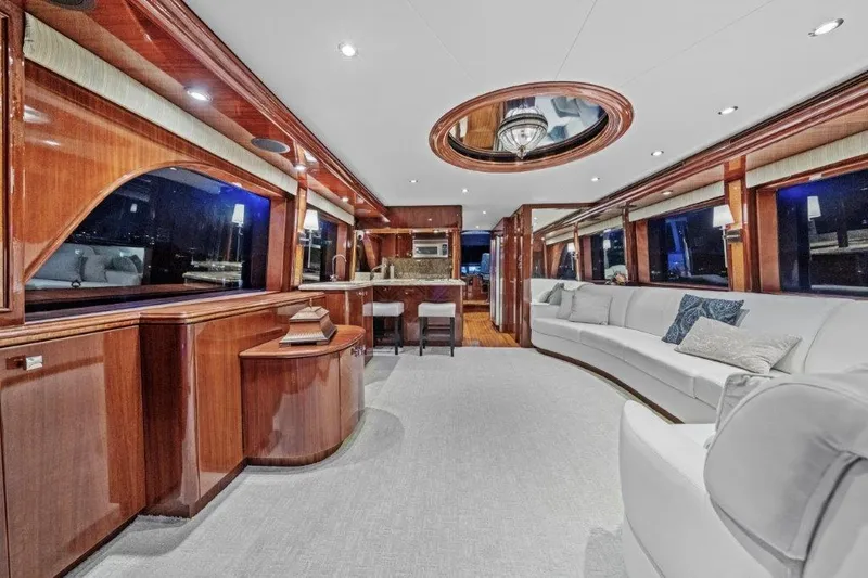 Slide: The Image of Luxurious interior of 2006 Cheoy Lee Motor Yacht with elegant wood finishes and plush seating. - 24
