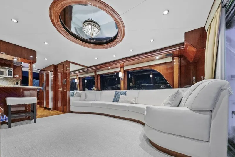 Slide: The Image of Luxurious interior of 2006 Cheoy Lee Motor Yacht with elegant seating and wood accents. - 31