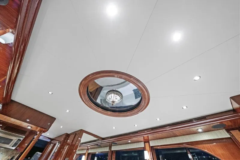 Slide: The Image of Ceiling view of 2006 Cheoy Lee Motor Yacht with elegant wood accents and lighting. - 32