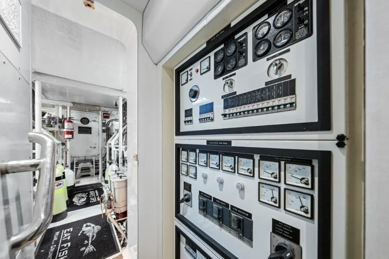 Slide: The Image of Engine room of 2006 Cheoy Lee Motor Yacht with control panels and equipment. - 37