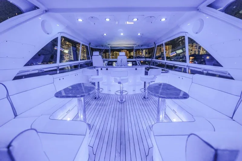 Slide: The Image of Luxurious 2006 Cheoy Lee motor yacht interior with elegant seating and ambient lighting. - 49