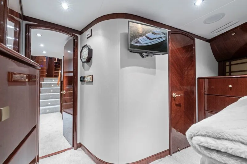 Slide: The Image of Luxurious interior of 2006 Cheoy Lee Motor Yacht with elegant wood finishes and modern amenities. - 8