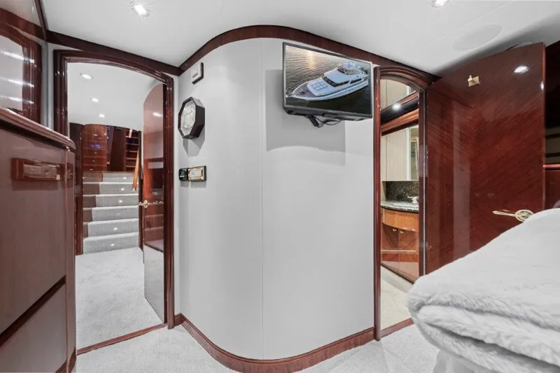 Slide: The Image of Luxurious interior of 2006 Cheoy Lee Motor Yacht with elegant wood finishes and modern amenities. - 9