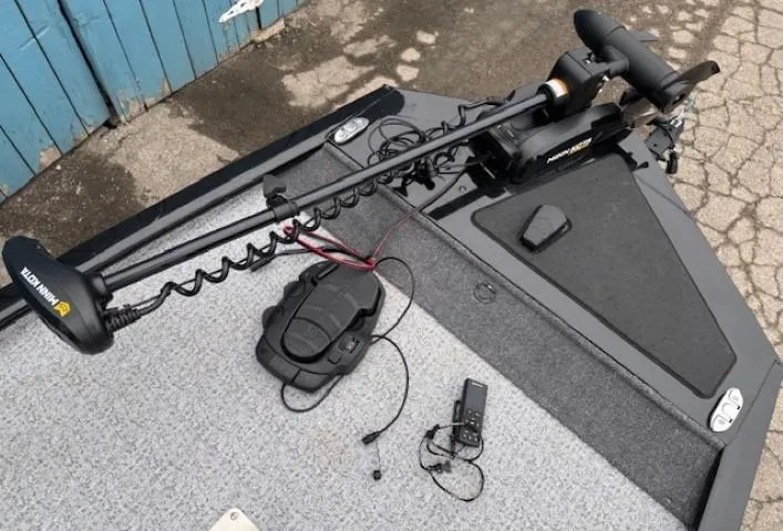 Slide: The Image of 2024 Tracker Pro 170 boat deck with trolling motor and accessories. - 8