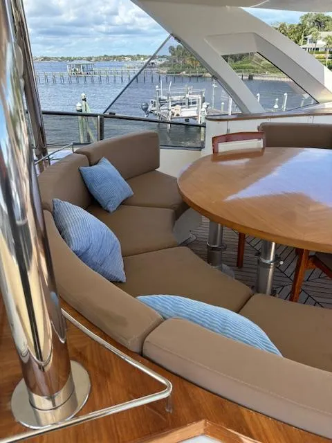 Slide: The Image of Luxurious seating area on a 2009 Astondoa 96 GLX yacht with scenic waterfront view. - 17
