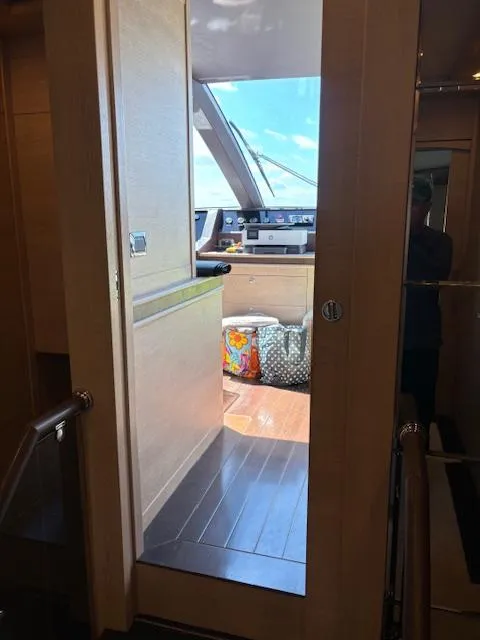 Slide: The Image of Interior view of 2009 Astondoa 96 GLX yacht, showcasing helm and modern design. - 24