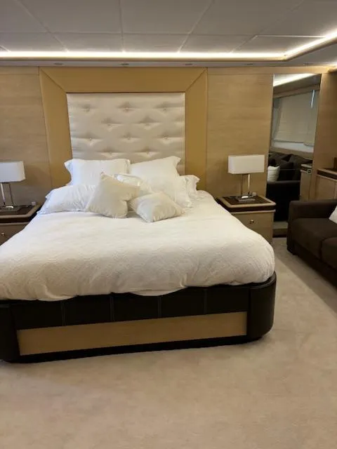 Slide: The Image of Luxurious bedroom interior on 2009 Astondoa 96 GLX yacht with elegant bedding and modern decor. - 26