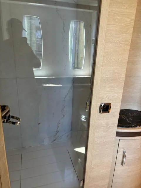 Slide: The Image of Bathroom interior of 2009 Astondoa 96 GLX yacht with glass shower door. - 30