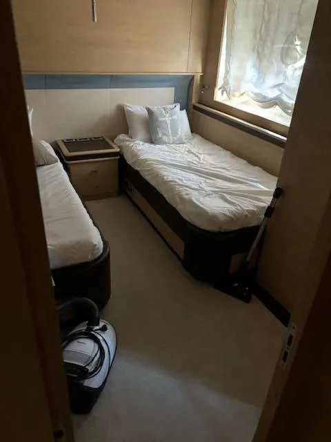 Slide: The Image of Interior cabin of 2009 Astondoa 96 GLX yacht with twin beds and window. - 37