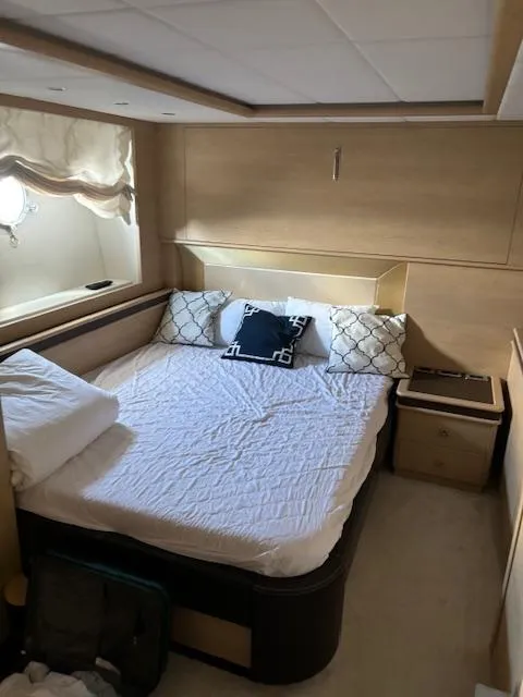 Slide: The Image of Luxurious bedroom in 2009 Astondoa 96 GLX yacht with elegant bedding and natural light. - 41