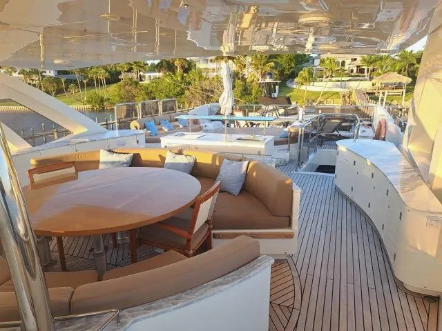 Slide: The Image of Luxurious 2009 Astondoa 95 GLX yacht deck with elegant seating and scenic views. - 44