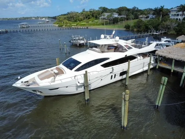 Slide: The Image of Luxury 2009 Astondoa 96 GLX yacht docked in scenic marina setting. - 7