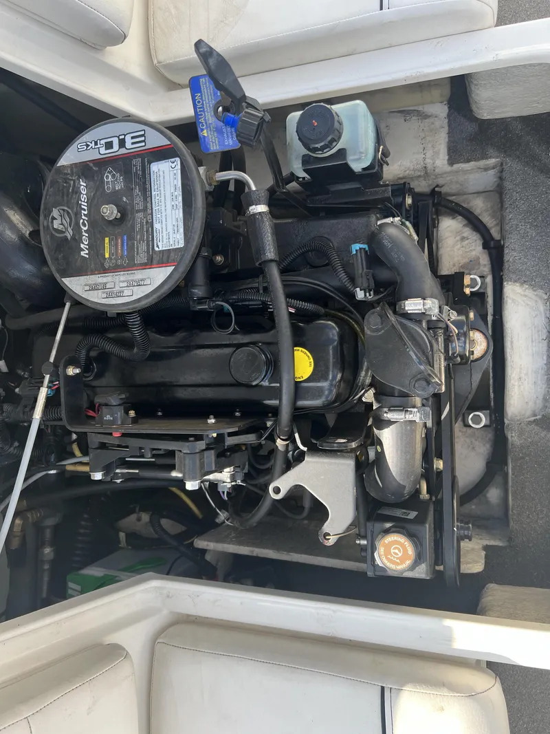 Slide: The Image of Engine compartment of a 2016 Bayliner 175 boat, featuring a MerCruiser 3.0L engine. - 10