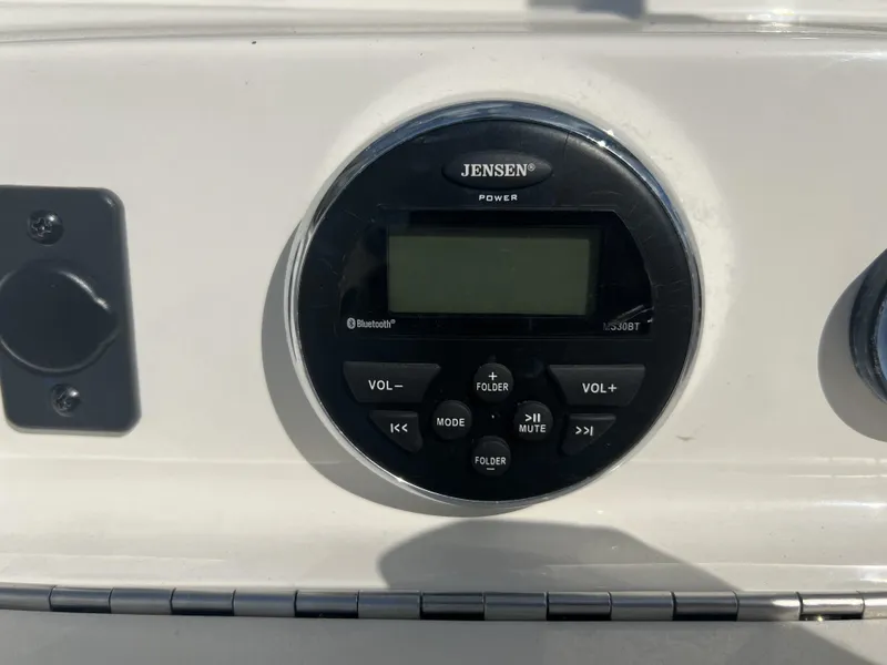 Slide: The Image of Jensen stereo system on 2016 Bayliner 175 boat dashboard. - 5