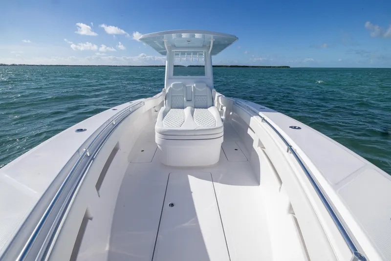 Slide: The Image of 2025 Invincible 36 Open Fisherman boat on calm ocean waters. - 10