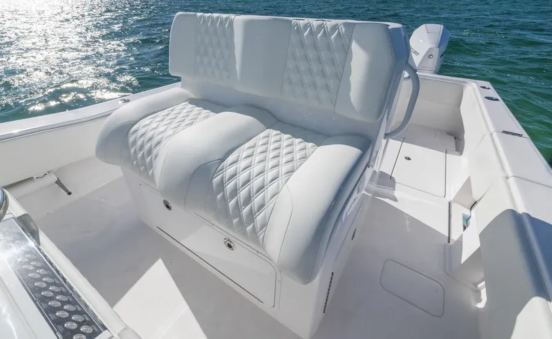 Slide: The Image of Luxurious seating on 2025 Invincible 36 Open Fisherman boat, featuring diamond-stitched upholstery. - 14