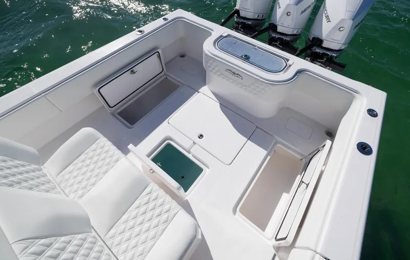 Slide: The Image of 2025 Invincible 36 Open Fisherman boat interior with seating and storage compartments. - 18