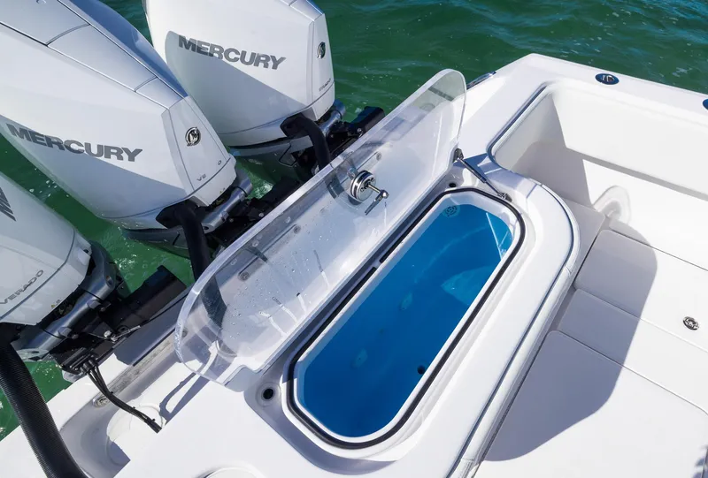Slide: The Image of 2025 Invincible 36 Open Fisherman boat with Mercury engines and open livewell. - 22