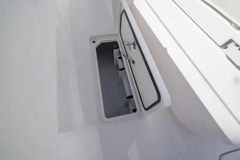 Slide: The Image of Open storage compartment on 2025 Invincible 36 Open Fisherman boat. - 28