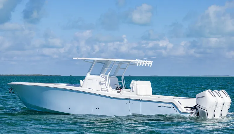 Slide: The Image of 2025 Invincible 36 Open Fisherman boat on calm ocean waters. - 33