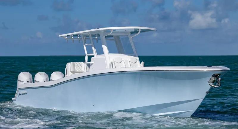 Slide: The Image of 2025 Invincible 36 Open Fisherman boat cruising on the ocean. - 34