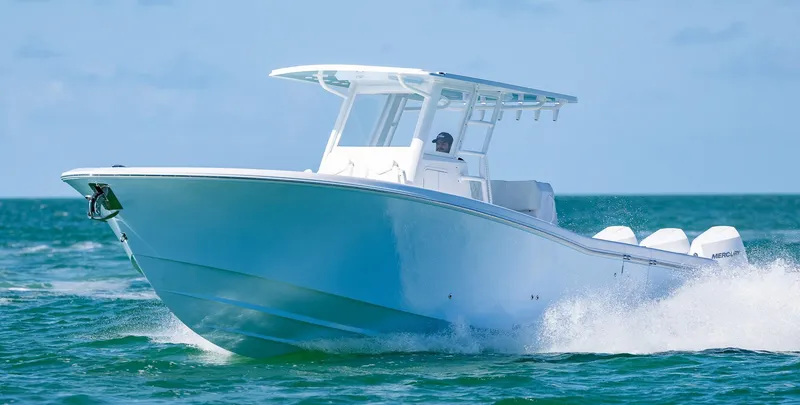 Slide: The Image of 2025 Invincible 36 Open Fisherman boat cruising on ocean waters. - 35