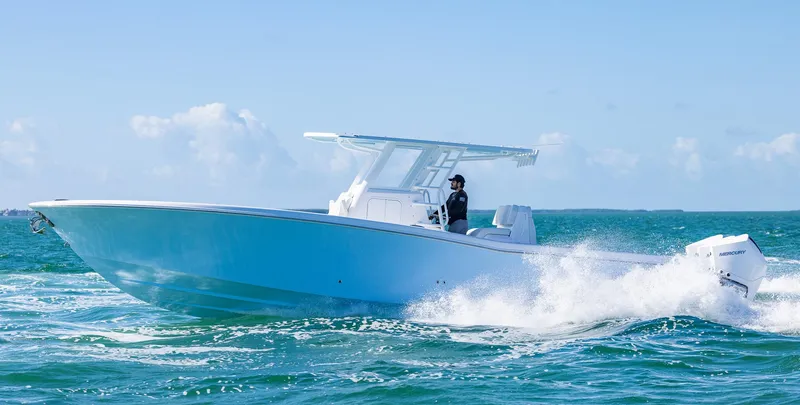 Slide: The Image of 2025 Invincible 36 Open Fisherman boat cruising on ocean waters. - 36