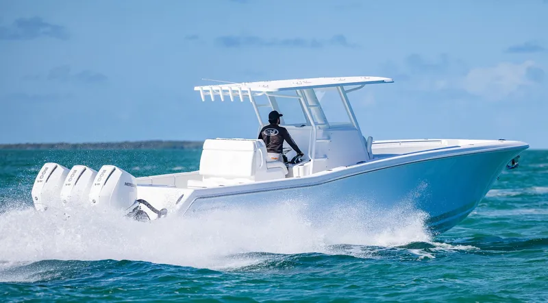 Slide: The Image of 2025 Invincible 36 Open Fisherman boat cruising on ocean waters. - 38