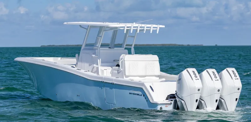 Slide: The Image of 2025 Invincible 36 Open Fisherman boat with triple engines on the ocean. - 5