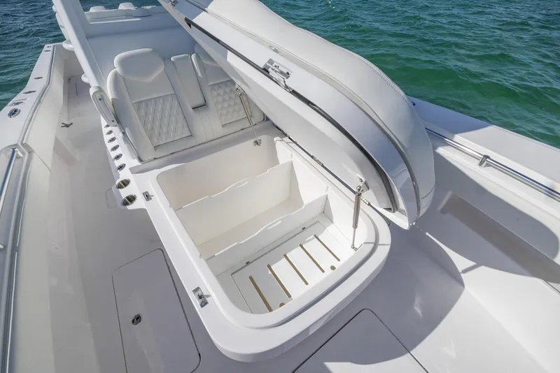 Slide: The Image of 2025 Invincible 36 Open Fisherman boat with open storage compartment on deck. - 9