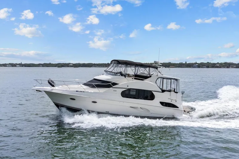 The Image of 2002 Silverton 43 Motor Yacht cruising on a sunny day. - 0