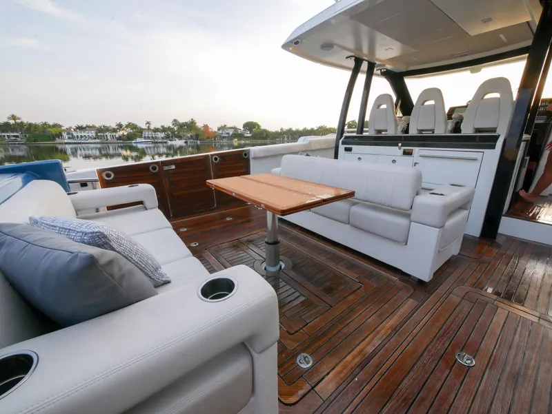 Slide: The Image of 2020 Ocean Alexander 45 Divergence Sport yacht with luxurious seating and wooden deck. - 15