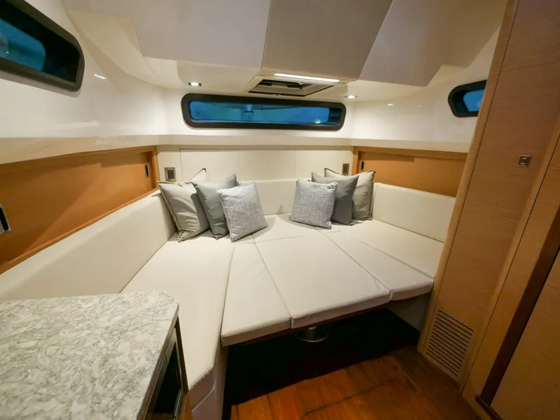 Slide: The Image of Luxurious interior of 2020 Ocean Alexander 45 Divergence Sport yacht with plush seating and cushions. - 22